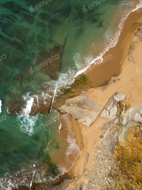 Preview: Surfer On The Beach Top View. Drone Shot On A Beach In A Summer Day.