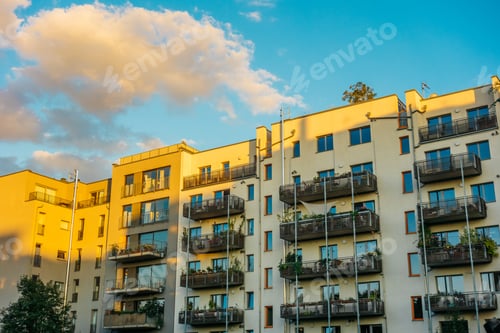 Preview: Modern Townhouse Apartment Buildings In Warm Sunlight