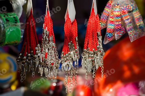 Preview: Bracelets Amulets Of Red Thread On The Counter Of A Souvenir Shop