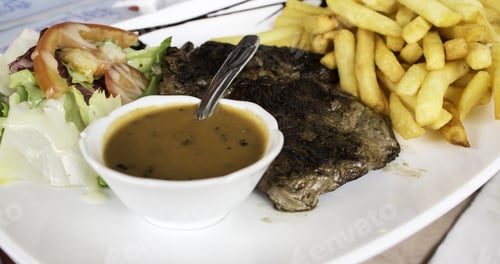 Entrecote With Fries And Salad In Restaurant, Gourmet Food