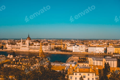 Preview: Warm Colored Picture Of Budapest With Danube River And Parliament In The Background