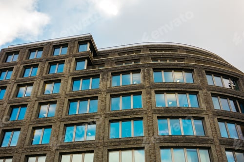 Preview: Brown Brick Office Building With Curved Facade