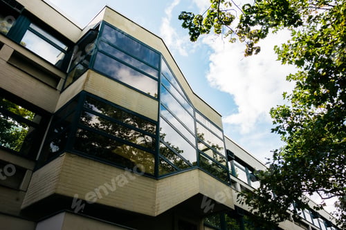Preview: Modern Office Facade With Cloud Reflections