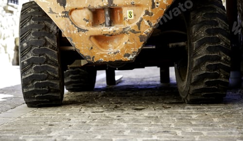 Preview: Gritty Construction Vehicle on Cobblestone Pavement