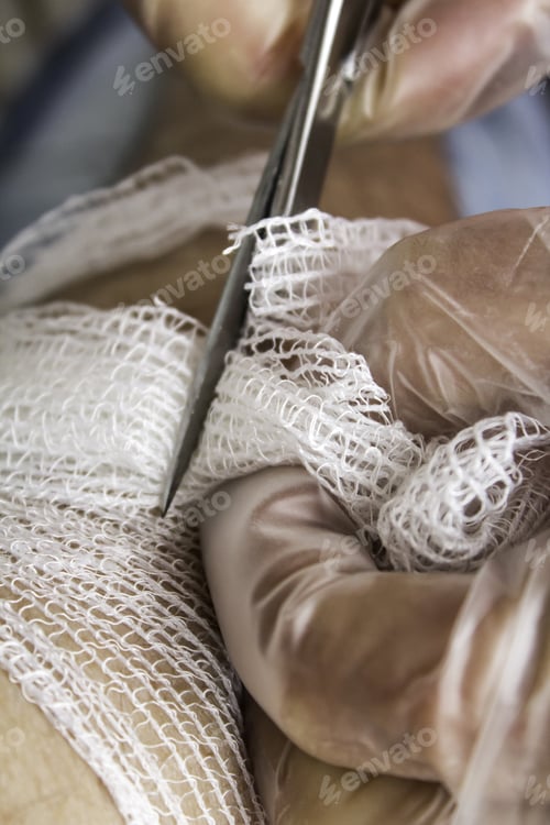 Preview: Arm Bandaging Nurse In Hospital