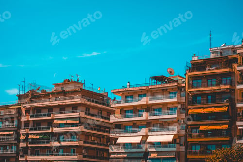 Preview: A Cityscape Showing Classic European Apartment Buildings And Architecture On A Clear Sunny Day.