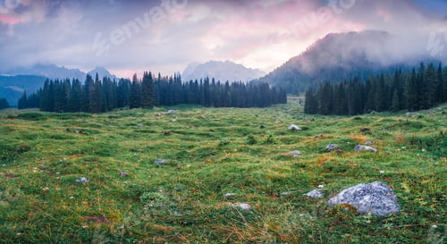 Preview: Dramatic Summer Sunrise With Cresta Di Enghe Mountain Range On Background. Foggy Morning Panorama