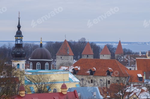 Preview: Medieval Towers Of Old Tallinn In The Cityscape On A Cloudy March Day. Estonia