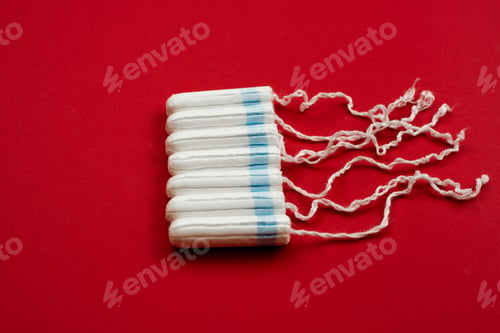 Preview: Hygienic Women'S Tampons On A Red Background, Cotton Swabs On The Right, Menstruation.