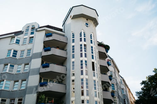 Preview: Grey Corner House With Futuristic Windows