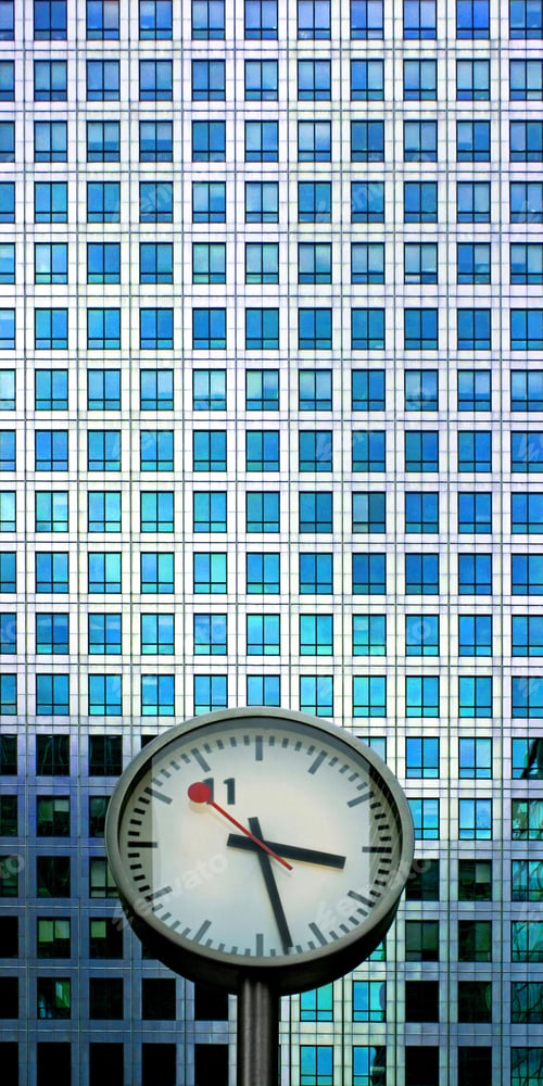 Preview: Analog Clock In Front Of Steel Facade