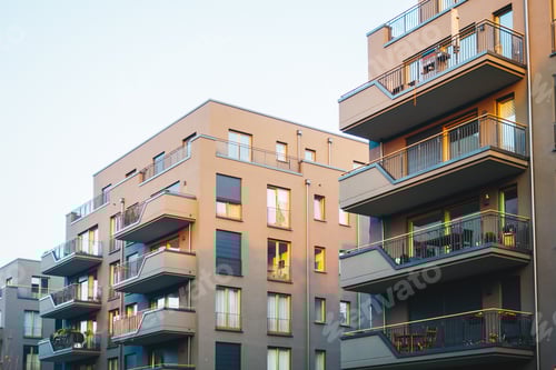 Preview: Grey Facaded Big Apartment Complexes In A Row