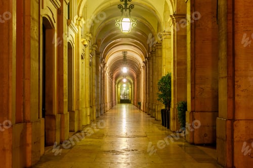Preview: Gallery On The Commerce Square Of Lisbon In The Night Illumination. Portugal.