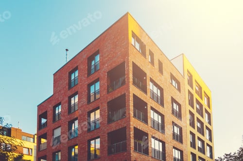 Preview: Modern Brick Building With Warm Sunlight