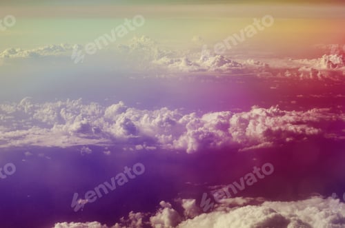 Preview: Airplane Illuminator View On Fluffy Cumulus Clouds And Blue Sky. Aerial View Background.