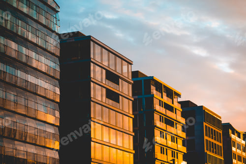 Preview: Some Glass Office Buildings In The Warm Sunlight