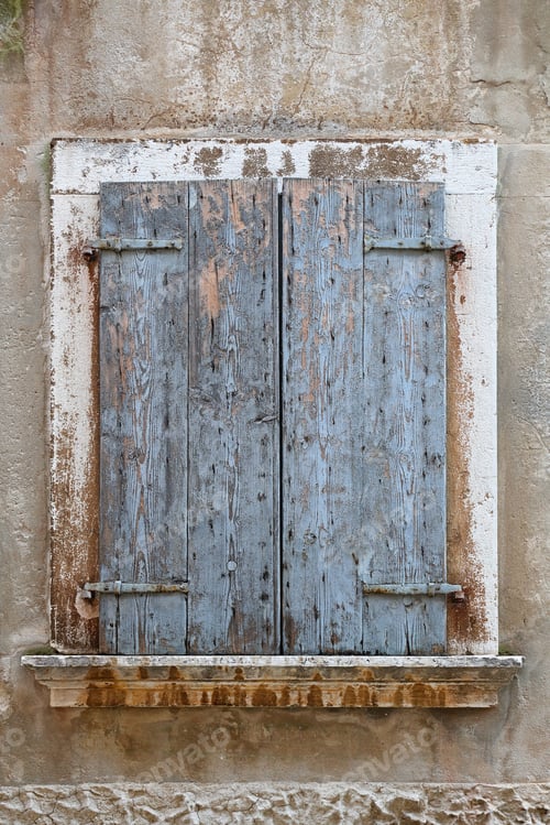 Preview: Closed Grunge Shutters At Weathered Old House