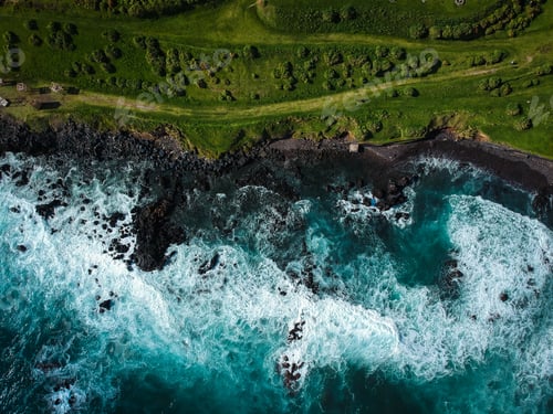 Preview: Aerial Top View Of Sea Waves Hitting A Beach With Black Volcanic Sand With Turquoise Sea Water