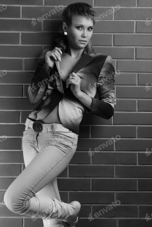 Preview: Portrait Of Beautiful Girl With A Brick Wall