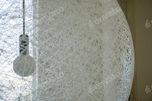 Preview: Hanging Globe Lamp Shade With Lit Bulb Inside