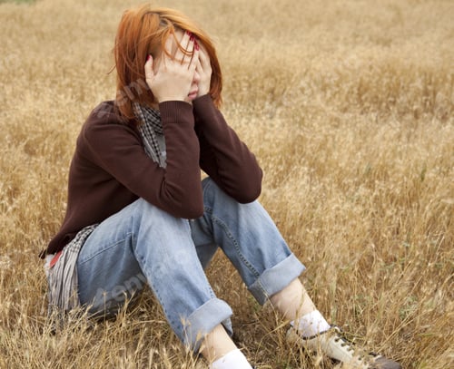 Preview: Lonely Sad Red-Haired Girl At Field