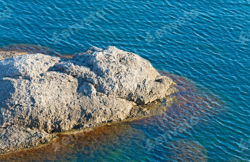 Preview: Transparent Coastal Azure Water Surface With Some Stones On Bottom