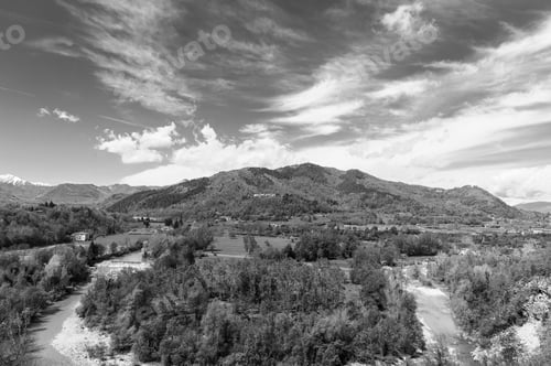 Preview: Bend Of The River At The Foothills Of Italian Alps In Piedmont. Landscape On The Background Of Of