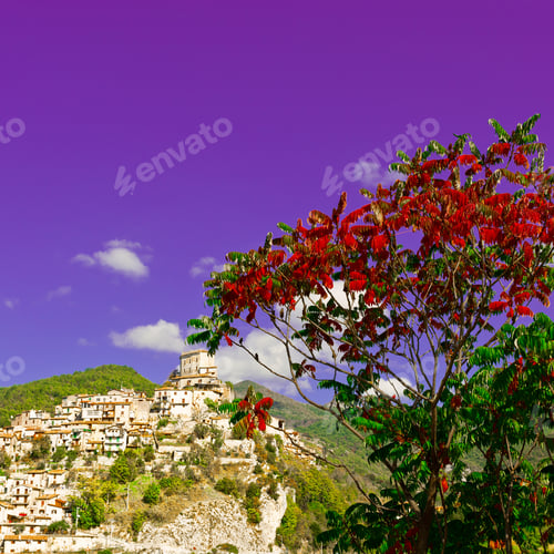 Preview: Red Leaves On The Background Of Medieval Italian City On A Hilltop