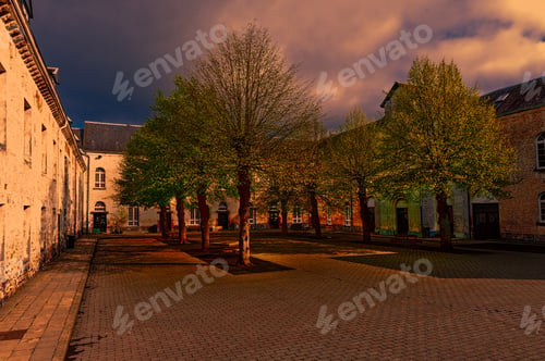 Preview: Patio Of The Belgian House With Park. The Old Pavement In St Hubert, Belgium At Sunset.