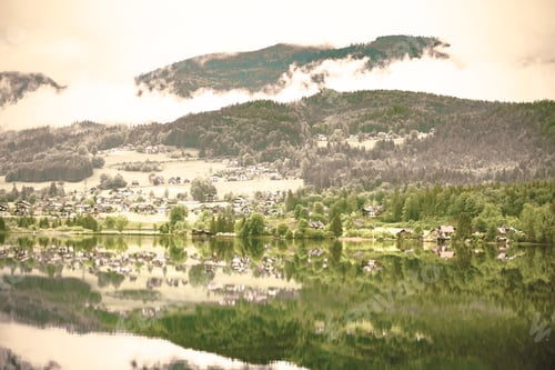 Preview: Rain And Clouds On The Hallstattersee In Austria. Morning Mist Over The Austrian Landscape With