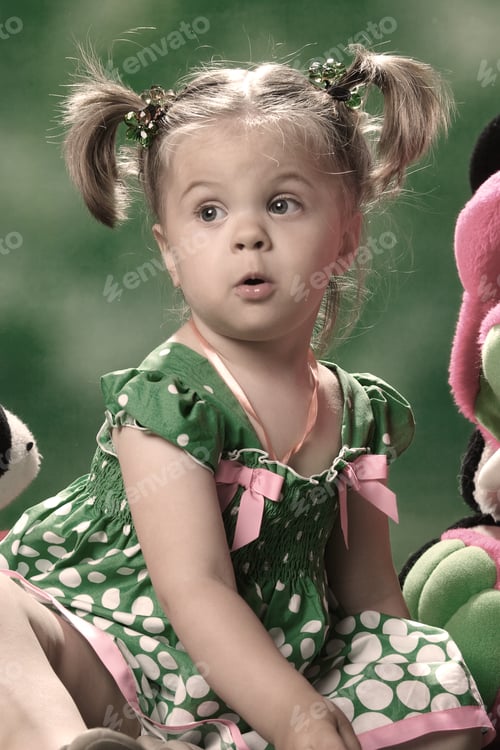 Preview: Emotional Portrait Of A Girl On A Green Background