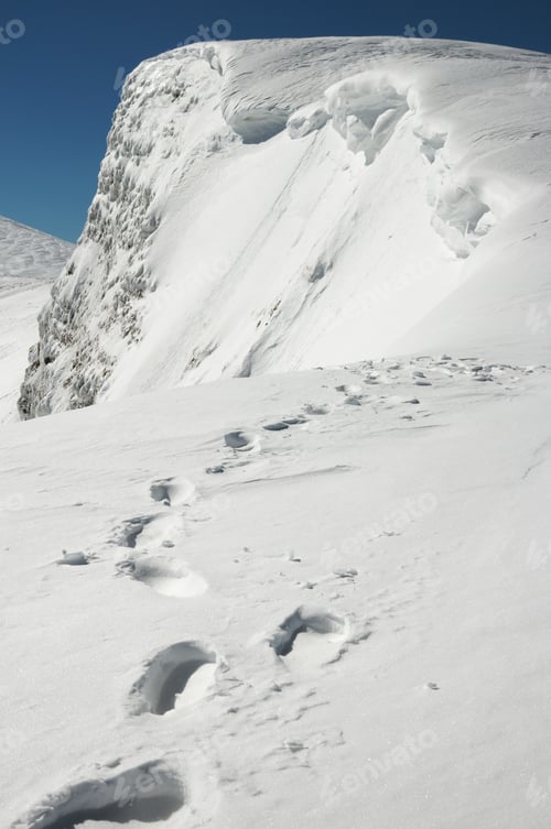 Preview: Winter Steep Crag And Human Footprint On Snow Follow To The Precipice (Ukraine, Carpathian Mt'S