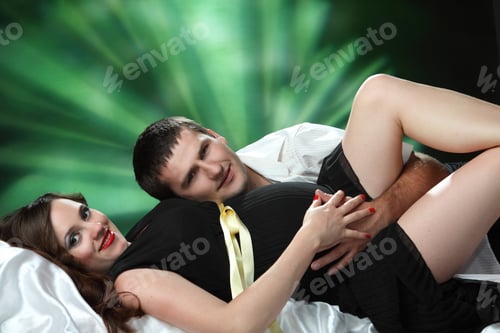 Preview: Beautiful Pregnant Woman And Man In Studio