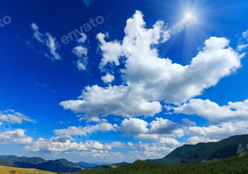 Preview: Beautiful Sunshiny Blue Sky With White Cumulus Clouds Over Summer Carpathian Mountain (Ukraine).