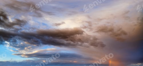 Preview: Summer Sunset After Rain Sky Panorama With Fleecy Purple Clouds And Rainbow. Evening Dusk Good