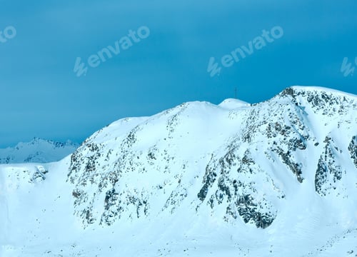 Preview: Morning Winter Silvretta Alps Landscape With Wooden Cross On Range ( Tyrol, Austria).