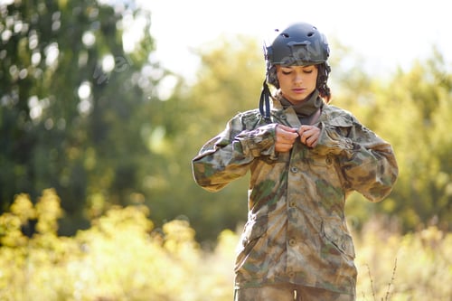Preview: Serious Soldier Woman Wearing Jacket In The Forest, She Is Going To Hunt