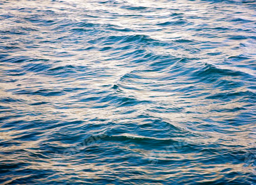 Preview: Azure Sea Water Surface With Ripple And Cloud Reflections