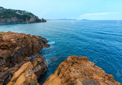 Preview: Summer Evening Sea Rocky Coast View With House On Shore. Costa Brava, Catalonia, Spain.
