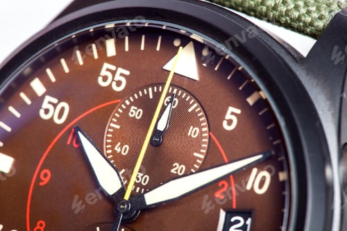 Preview: Winding Wristwatch With A Brown Iron Dial With Arrows, Close Up Side View Clock Details.
