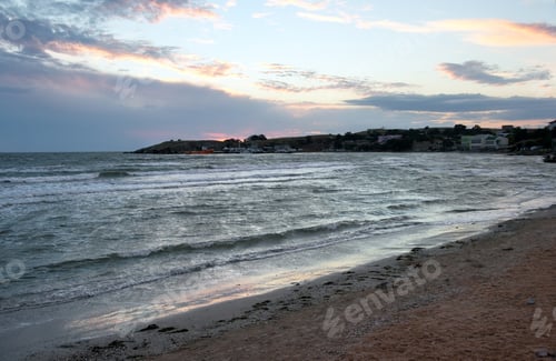 Preview: Evening Sandy Sea Coast And Small Port Far Away