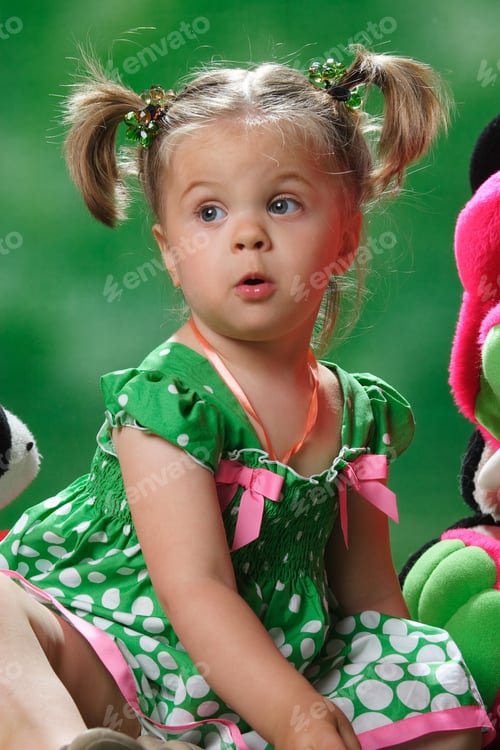 Preview: Emotional Portrait Of A Girl On A Green Background