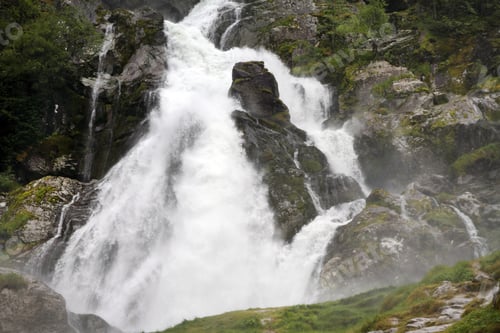 Preview: Waterfall Springing From Briksdal Glacier, Jostedalsbreen National Park, Norway.
