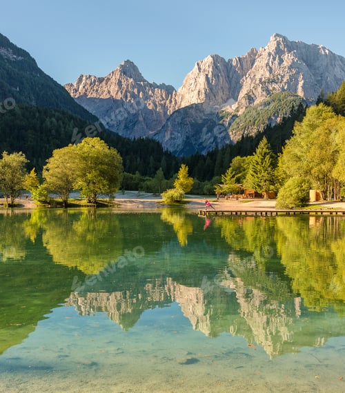 Preview: Morning Yoga Exercise At Lake Jasna In Slovenia.