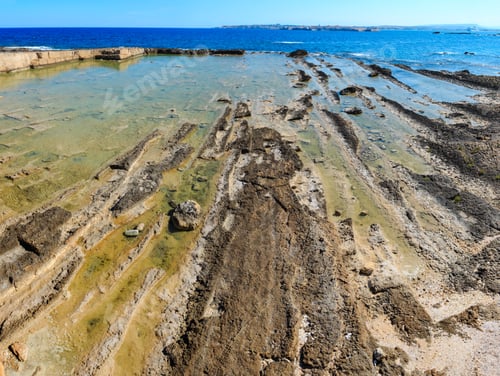 Preview: Stone Geological Structures On Massolivieri Summer Sea Coast (Siracusa, Sicily, Italy).