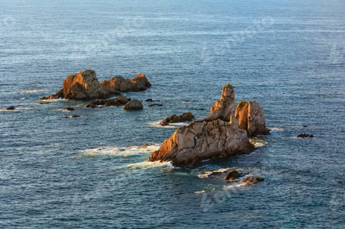 Preview: Sharp Islets Near Gueirua Beach (Asturias, Spain). Evening Atlantic Ocean Landscape.