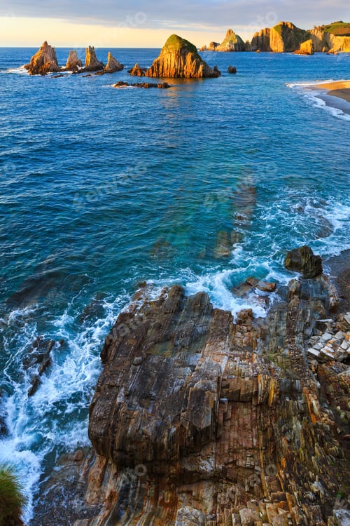 Preview: Evening Atlantic Ocean Coastline Landscape. Beautiful Gueirua Beach With Sharp Islets. Asturias