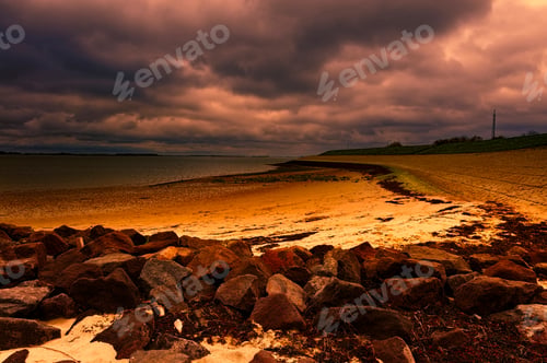 Preview: The North Sea Coast In Zealand At Sunset, Netherlands. Dutch Landscape With View On The Dike
