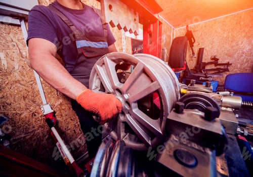 Preview: Professional Car Mechanic Replace Tire On Wheel. Auto Repair Service. Cleaning Disc
