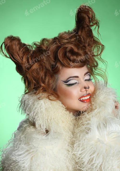 Preview: Beautiful Young Woman. Stylish Hairstyle, Make-Up Art. Vivid Emotions . Year Goat